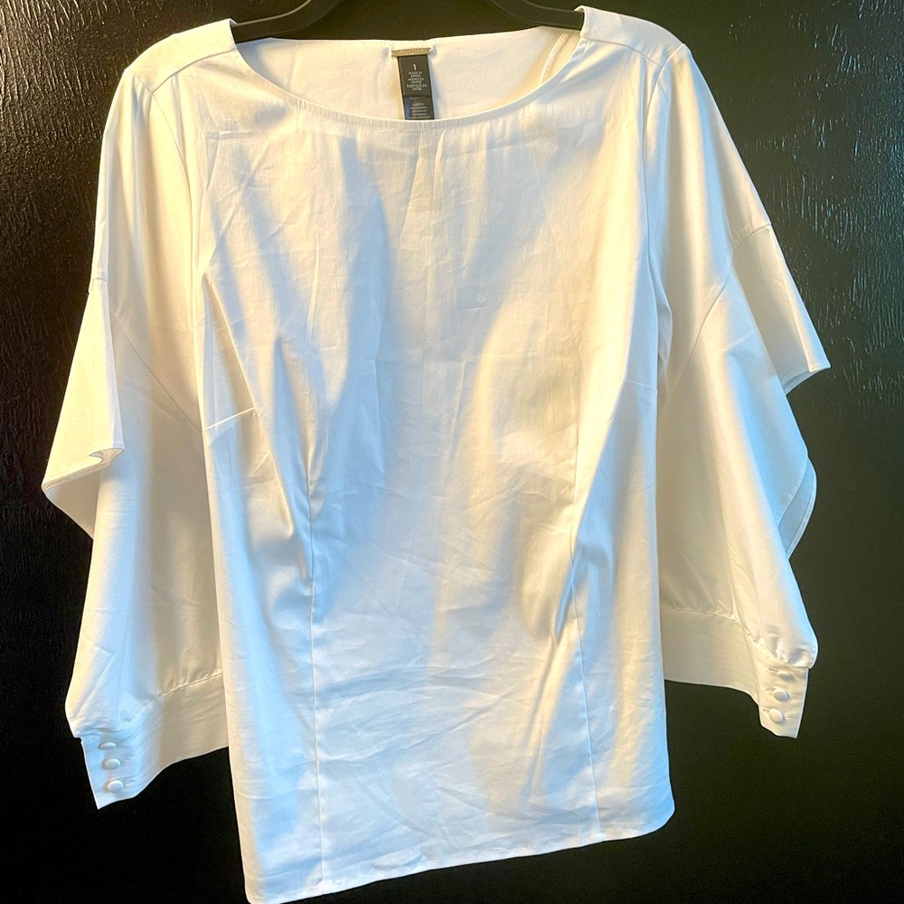 WHITE BLOUSE WITH DRAPED OPEN ARM SLEEVE WITH ELEGANT BUTTON CLOSURE